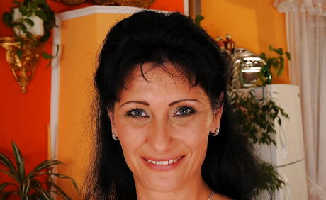 Very attractive brunette aged Susan exposes big titties and spreads her legs 