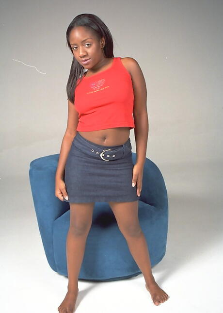 Adorable milf Andrea in skirt denudes big boobies and bald pussy 